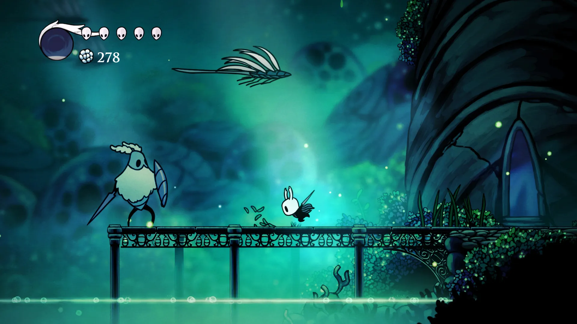 Screenshot of a mossy area and a metal bridge in Hollow Knight